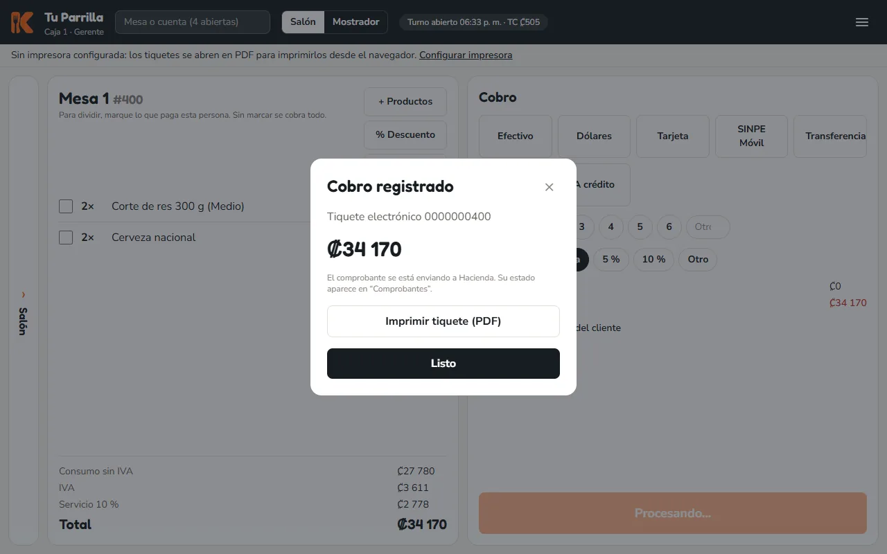 Pantalla: Sale «Cobro registrado» con el número del comprobante y el vuelto